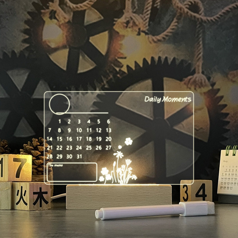 Transparent calendar with floral design on a wooden block and gear background
